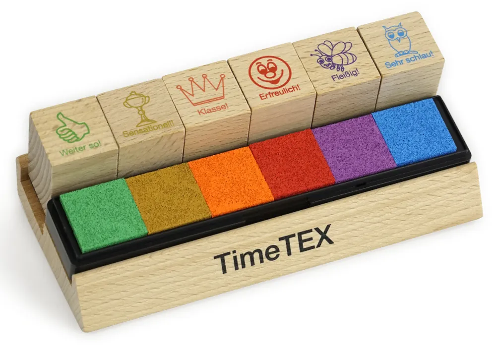 Set med lärarstämplar i trä, 6 st. "Motivation", olika färger